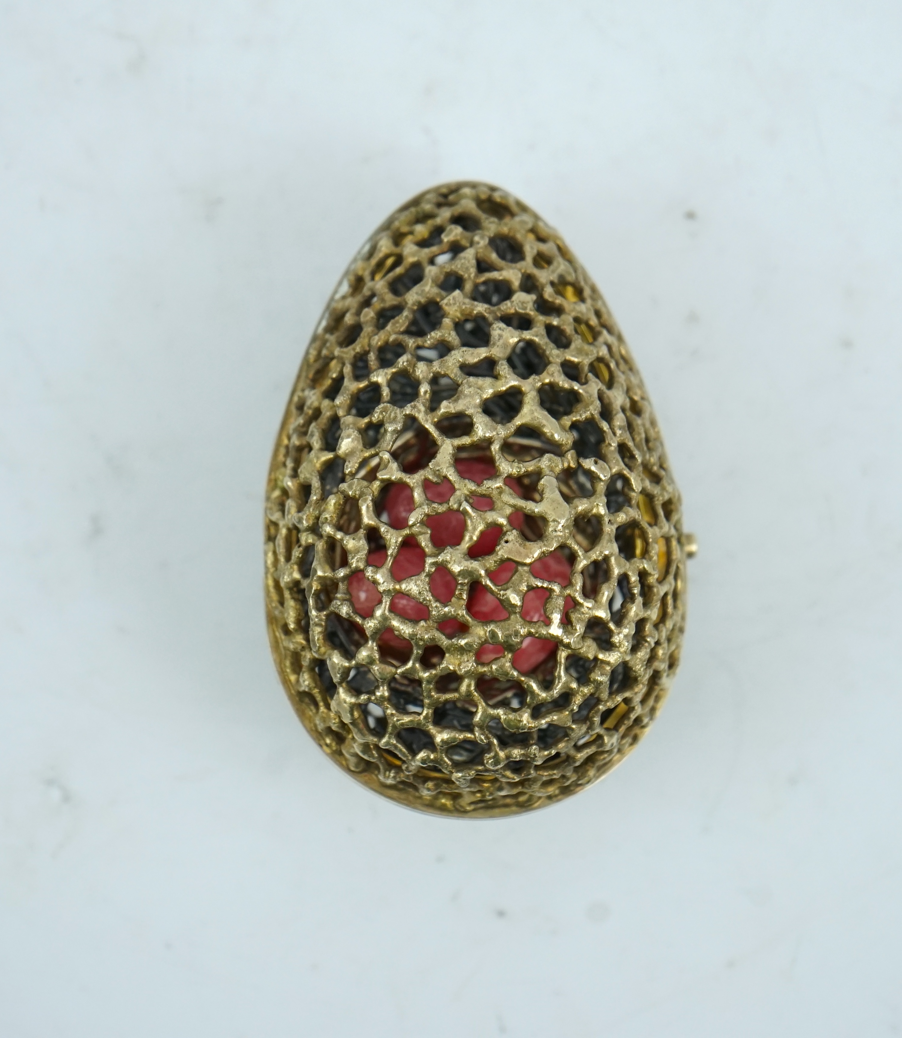 An Elizabeth II pierced silver gilt surprise egg by Stuart Devlin